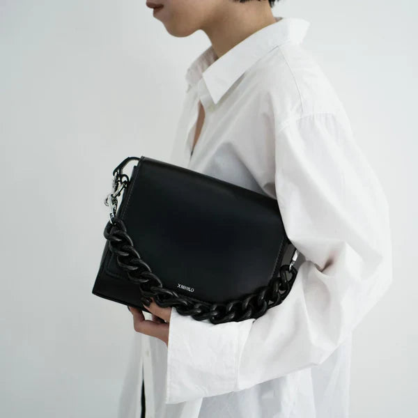 X-NIHILO Handbags
