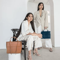X-Nihlio Handbags bags Bank Bag in Tan